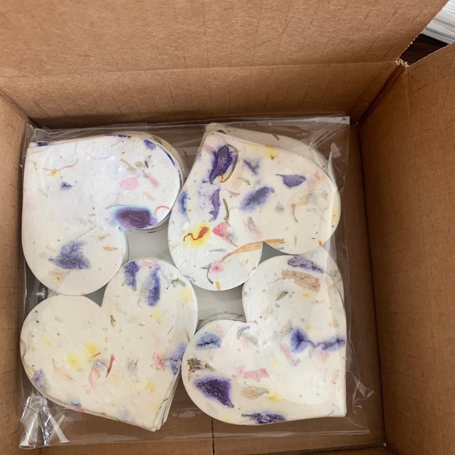seed paper hearts shown in shipping box

