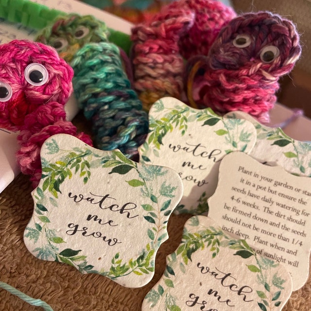 watch me grow tags with knitted creatures
